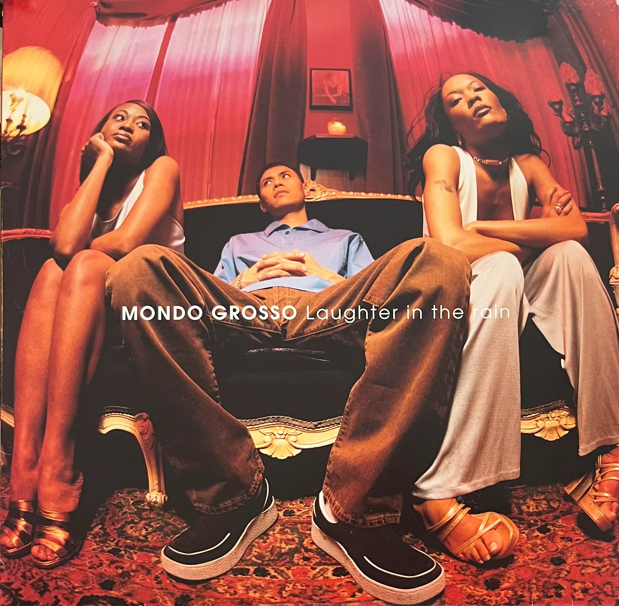 MONDO GROSSO / LAUGHTER IN THE RAIN